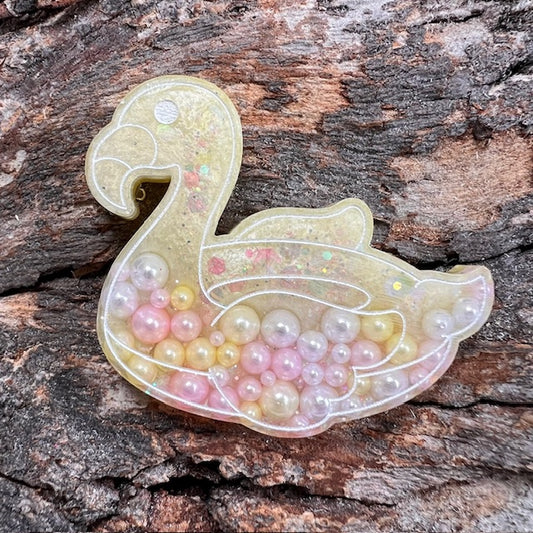 Flamingo floatie tag