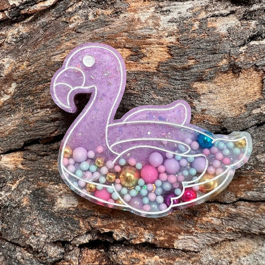 Flamingo floatie tag